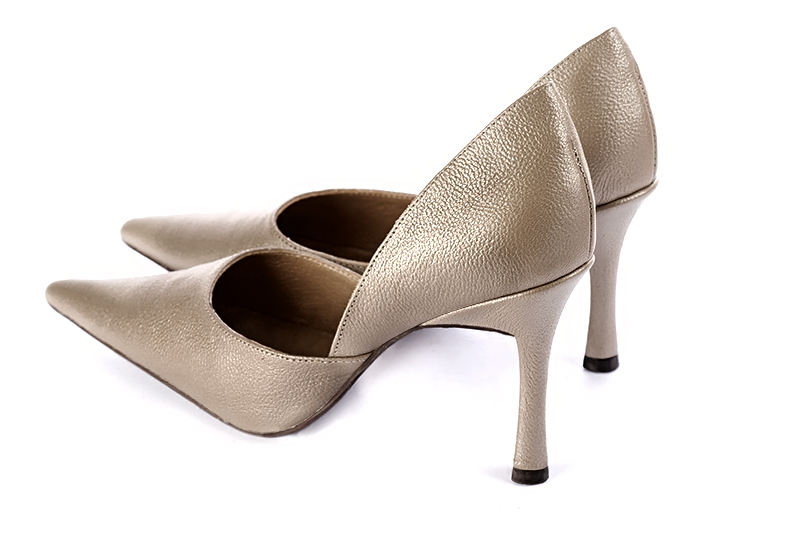Tan beige women's open arch dress pumps. Pointed toe. Very high slim heel. Rear view - Florence KOOIJMAN
